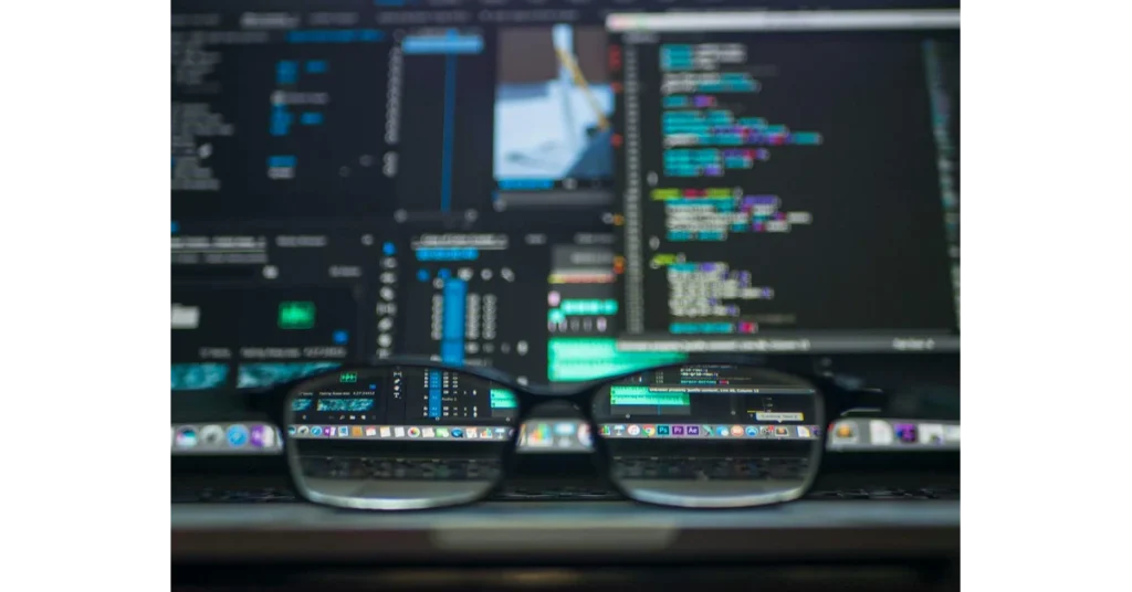 Glasses and a computer with code